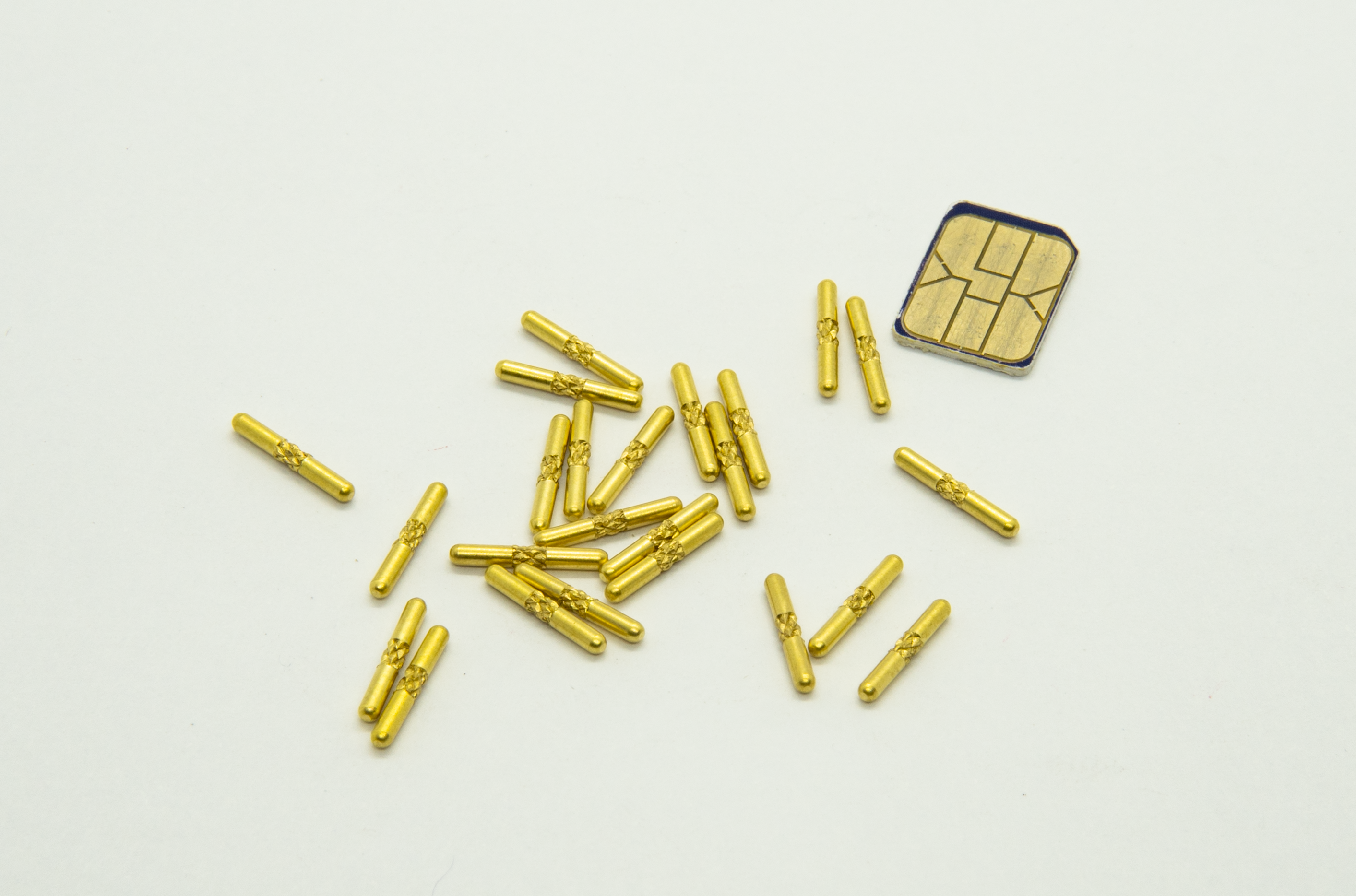 High-precision screw machine products made by AVF Decolletage in brass, aluminum, and stainless steel.