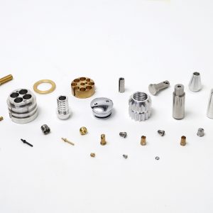 High-precision screw machine products manufactured by AVF Decolletage using Swiss CNC and CAM technology.