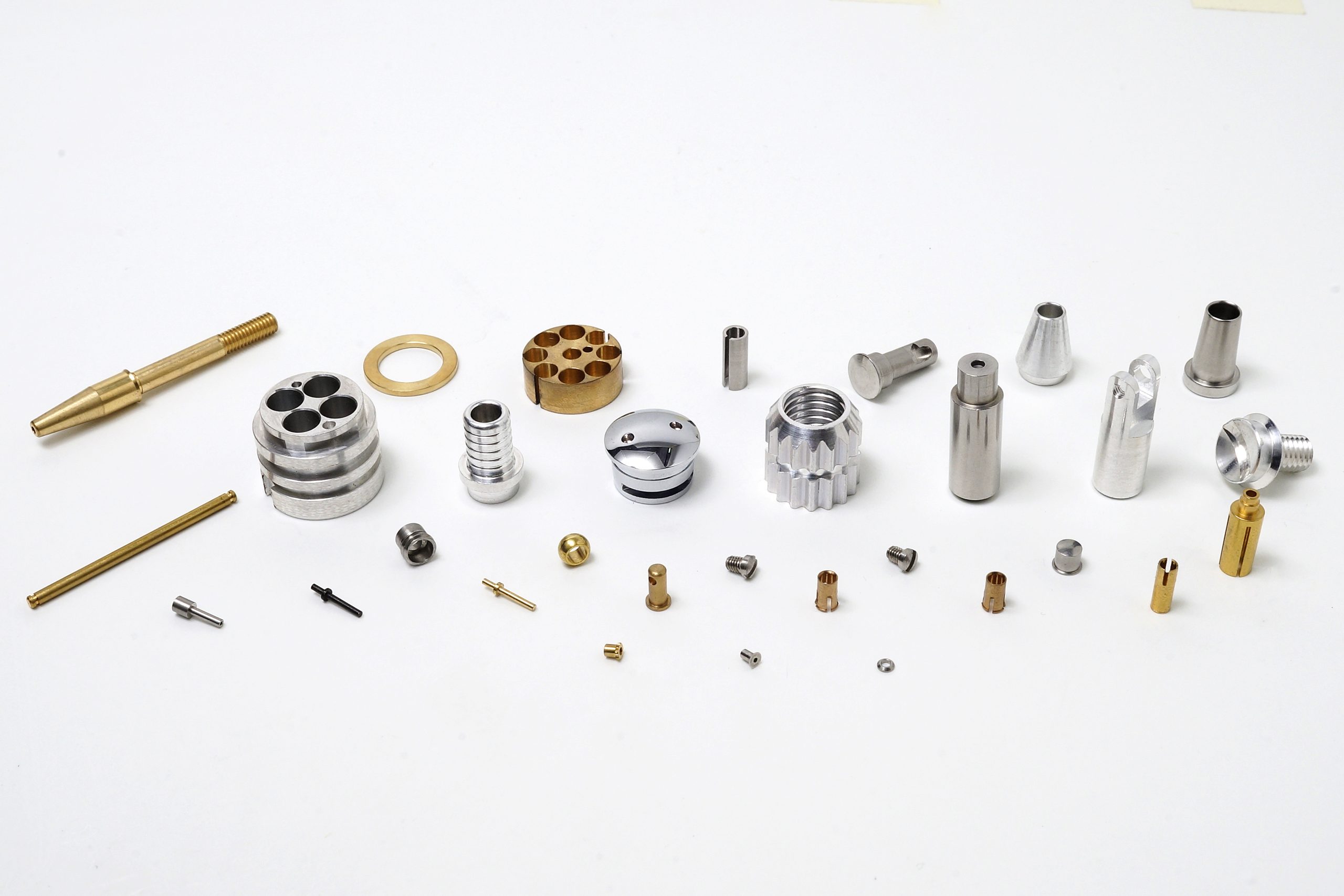 High-precision screw machine products manufactured by AVF Decolletage using Swiss CNC and CAM technology.