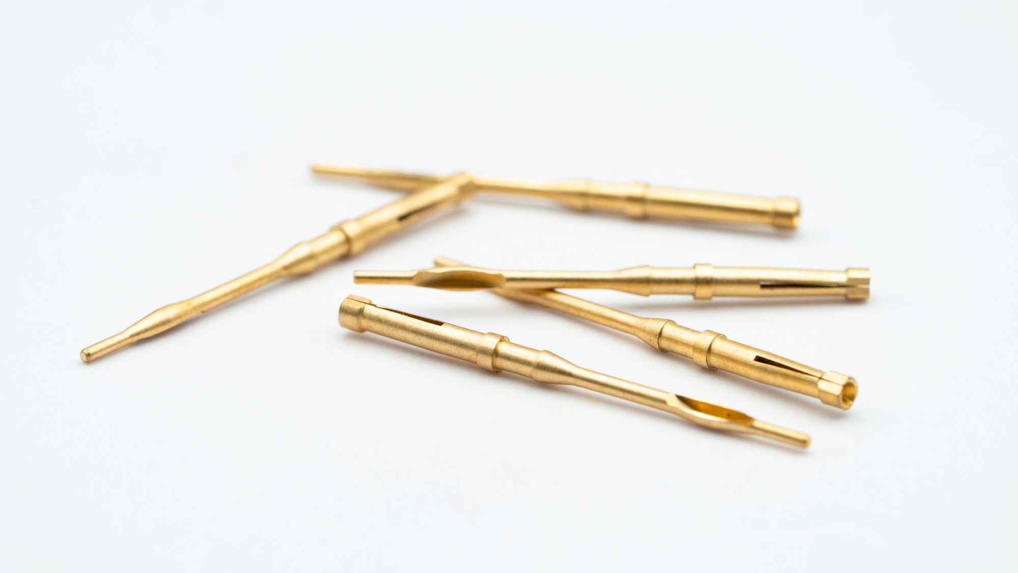 Precision connector pins with various geometries manufactured by AVF Decolletage.